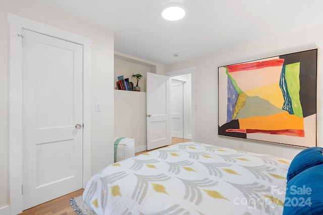 bedroom featuring hardwood / wood-style flooring