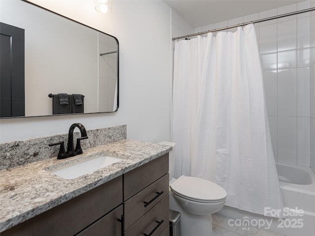 full bath with toilet, shower / tub combo, and vanity