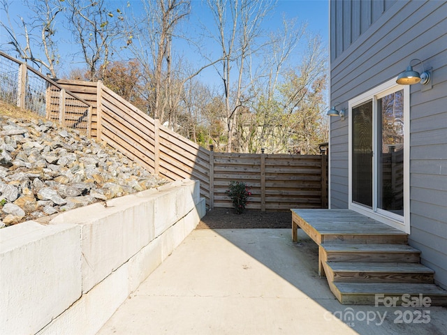 view of patio with a fenced backyard