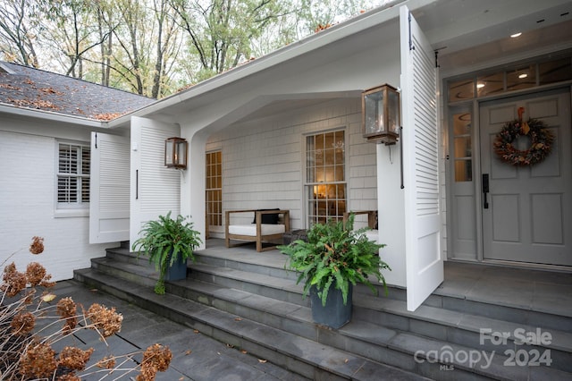 property entrance with a porch