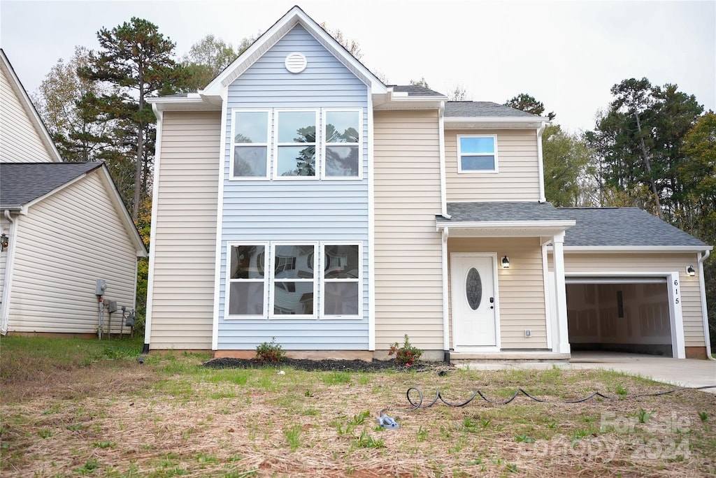 view of front of property featuring a garage