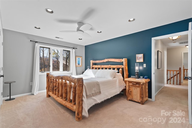 carpeted bedroom featuring ceiling fan