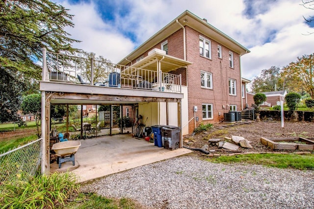 back of house featuring a patio and central AC