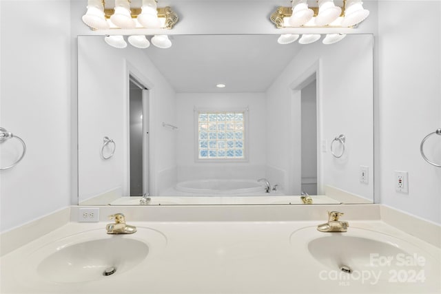 bathroom featuring a bathtub and vanity