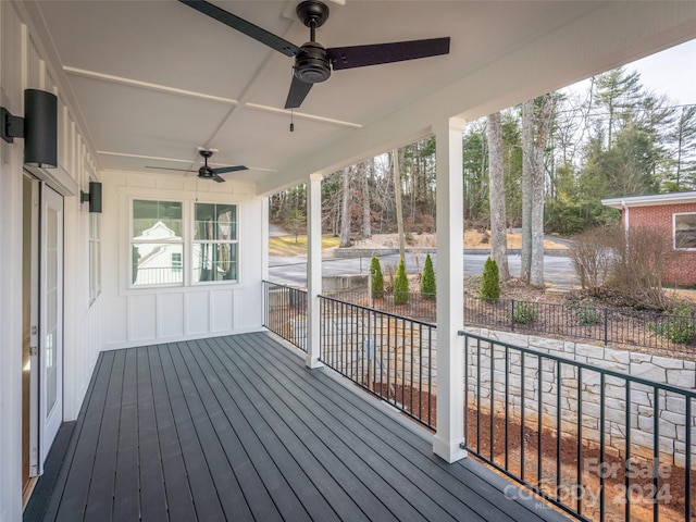 wooden terrace with ceiling fan