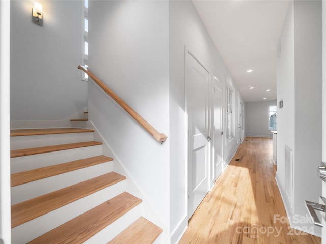 corridor featuring light wood-type flooring