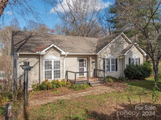 view of front of home with a front lawn