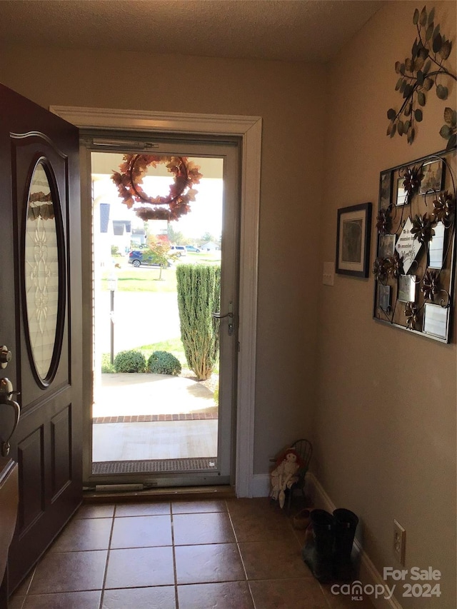 interior space featuring light tile patterned floors