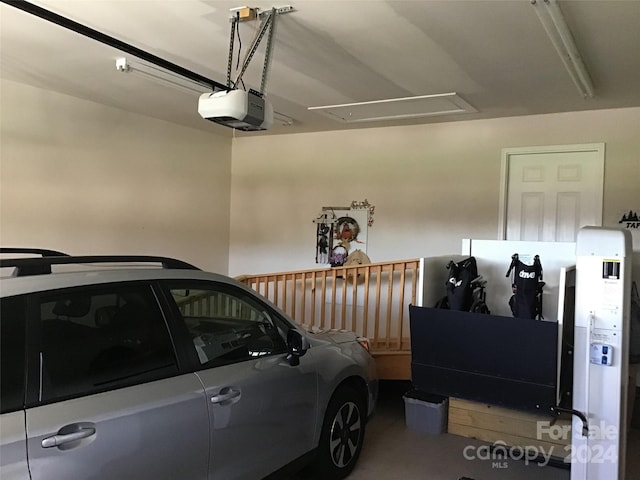 garage featuring a garage door opener