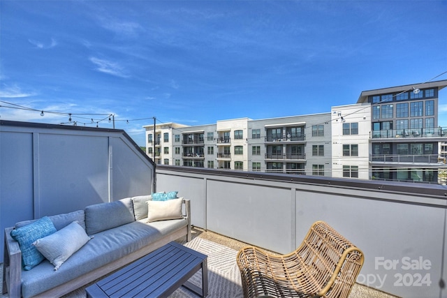 balcony featuring an outdoor living space