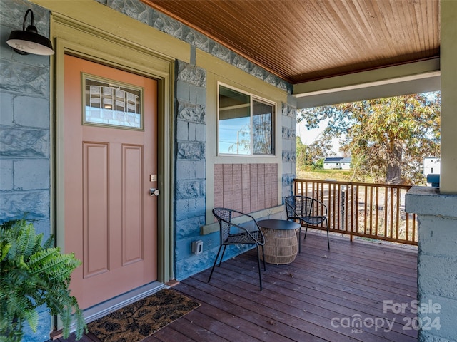 entrance to property with a porch