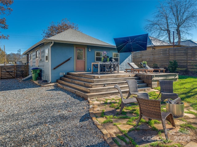 rear view of house with a patio area