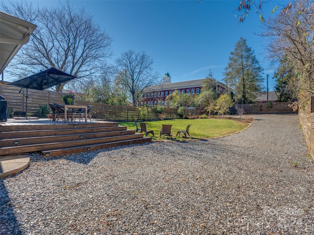 view of yard featuring a deck