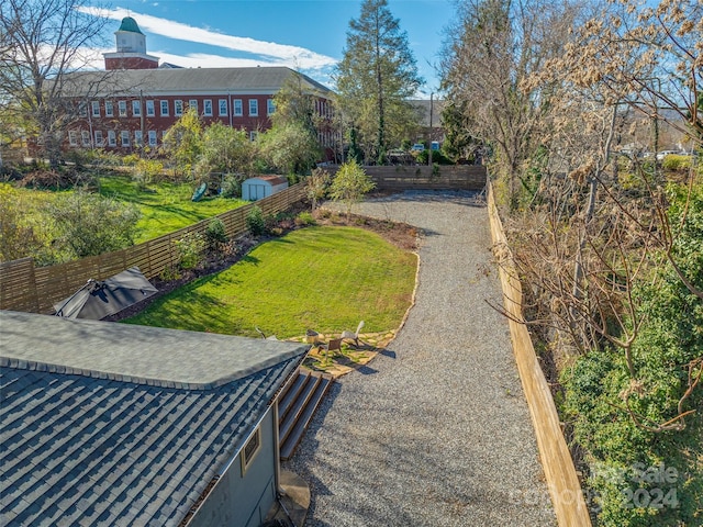 view of community featuring a lawn