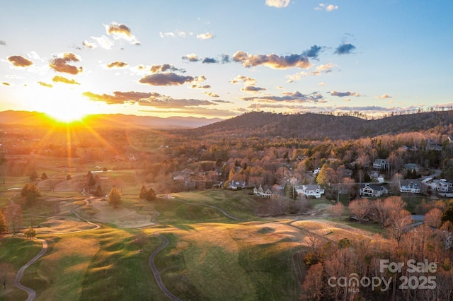 property view of mountains featuring a wooded view