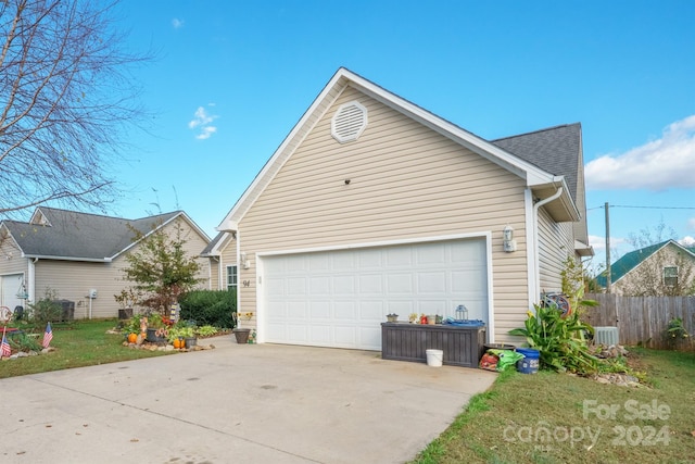 view of property exterior featuring a garage