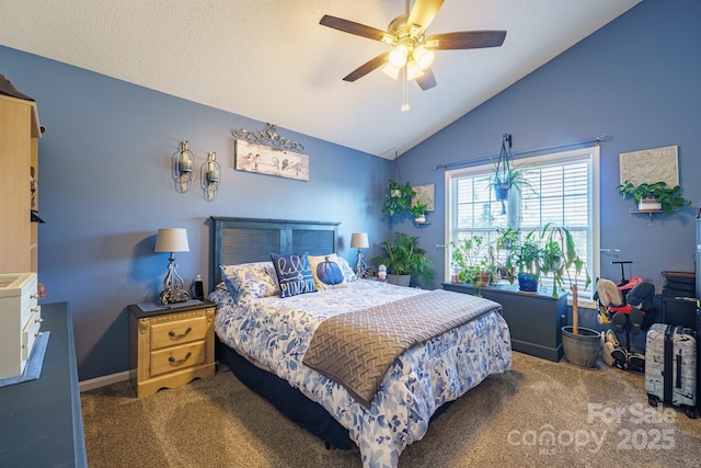 carpeted bedroom featuring vaulted ceiling and ceiling fan