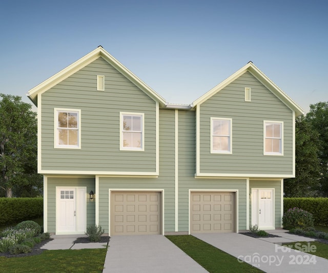 view of front of property featuring a garage