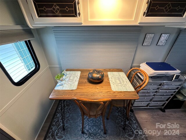 dining space featuring hardwood / wood-style flooring