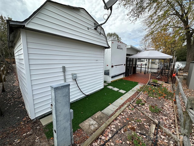 view of home's exterior featuring a gazebo