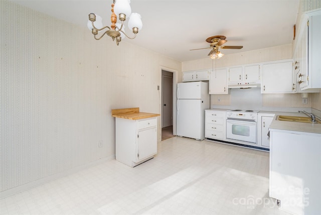 kitchen featuring white cabinets, ceiling fan with notable chandelier, white appliances, and sink