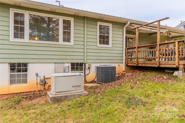 back of property with central air condition unit