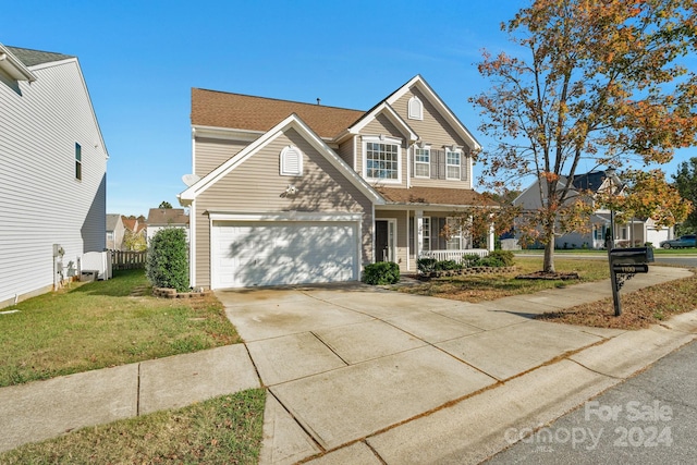 front facade featuring a front yard and a porch