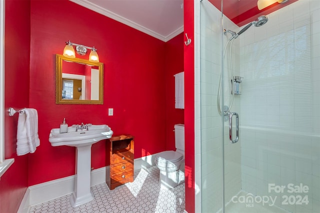 bathroom featuring toilet, tile patterned flooring, an enclosed shower, and ornamental molding