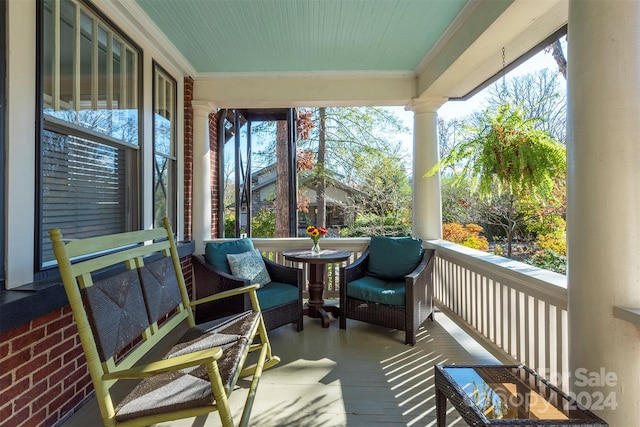 sunroom with ornate columns