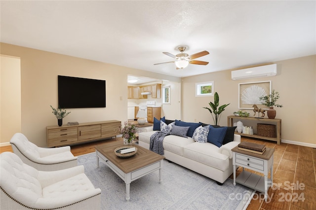 living room with a wall mounted AC, ceiling fan, and light wood-type flooring