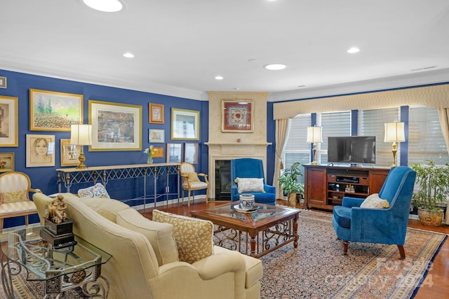 living room featuring ornamental molding and hardwood / wood-style floors