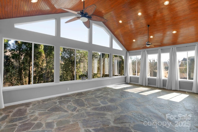 unfurnished sunroom featuring a ceiling fan, lofted ceiling, and wood ceiling