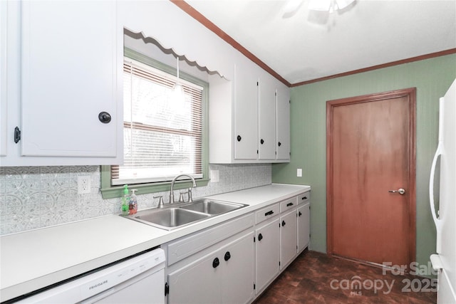 kitchen with decorative backsplash, sink, white appliances, ornamental molding, and white cabinets