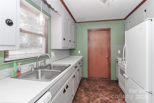 kitchen with white cabinetry, decorative light fixtures, white appliances, ornamental molding, and sink