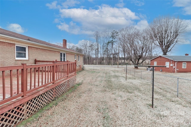 view of yard featuring a deck