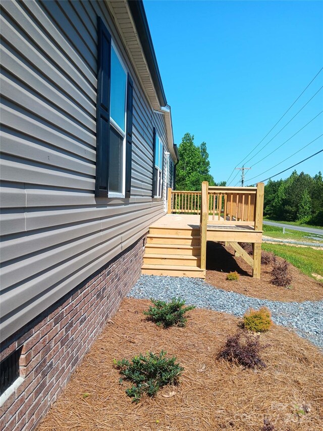1245 Cleveland Ave, Grover, NC 28073 - view of property exterior with a deck