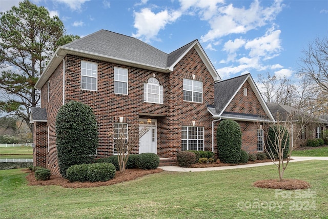 view of front of home with a front yard