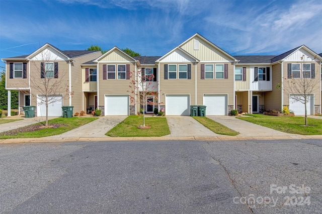 view of property with a front lawn