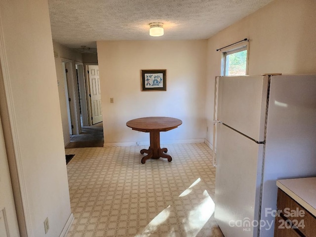 bathroom with a textured ceiling