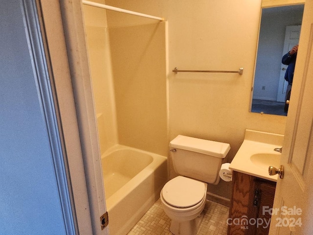 full bathroom featuring toilet, tub / shower combination, and vanity