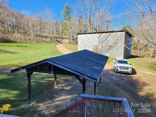 view of home's community with a yard