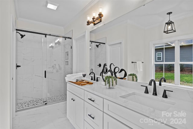 bathroom featuring vanity, an enclosed shower, and crown molding