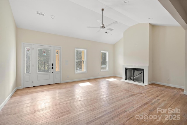 unfurnished living room featuring high vaulted ceiling, ceiling fan, and light wood-type flooring