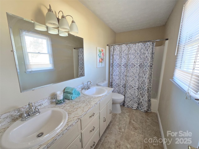 full bathroom featuring toilet, vanity, and shower / bath combo