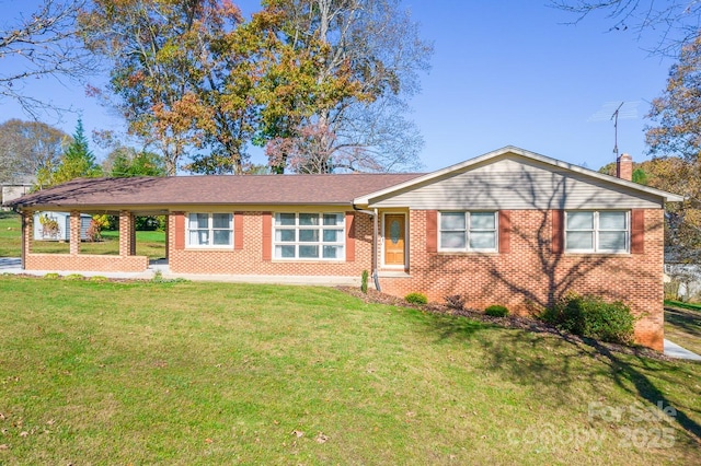 ranch-style home featuring a front yard