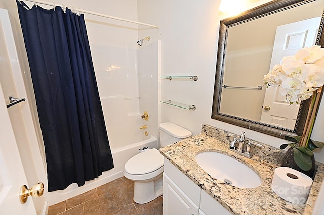 full bathroom featuring tile patterned floors, vanity, toilet, and shower / bath combo with shower curtain