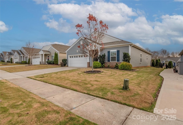 single story home with a front yard and a garage