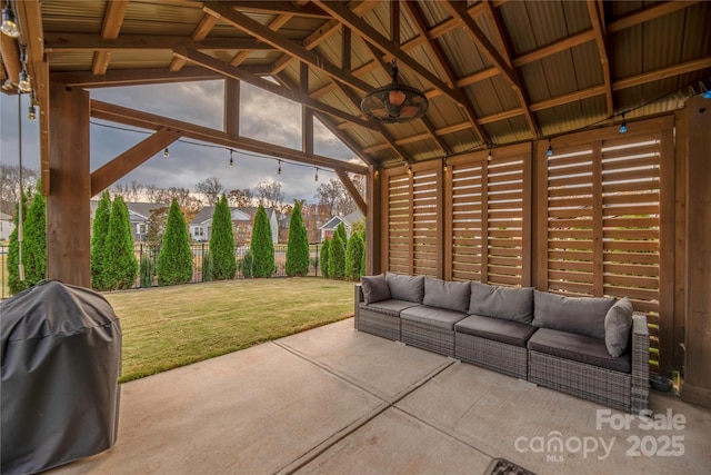 view of patio / terrace with a gazebo, grilling area, ceiling fan, and an outdoor living space