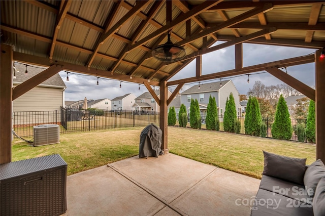 view of patio with central air condition unit, a gazebo, and ceiling fan