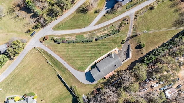 birds eye view of property featuring a rural view